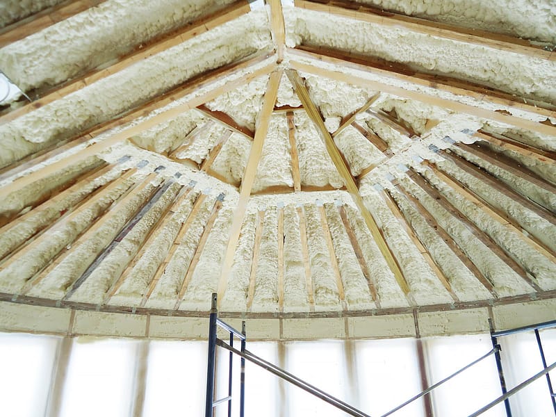 A round arched ceiling with spray foam insulation